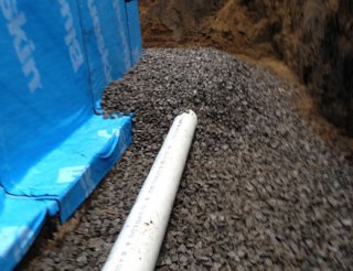 Comment faire un bon drainage autour d'une maison